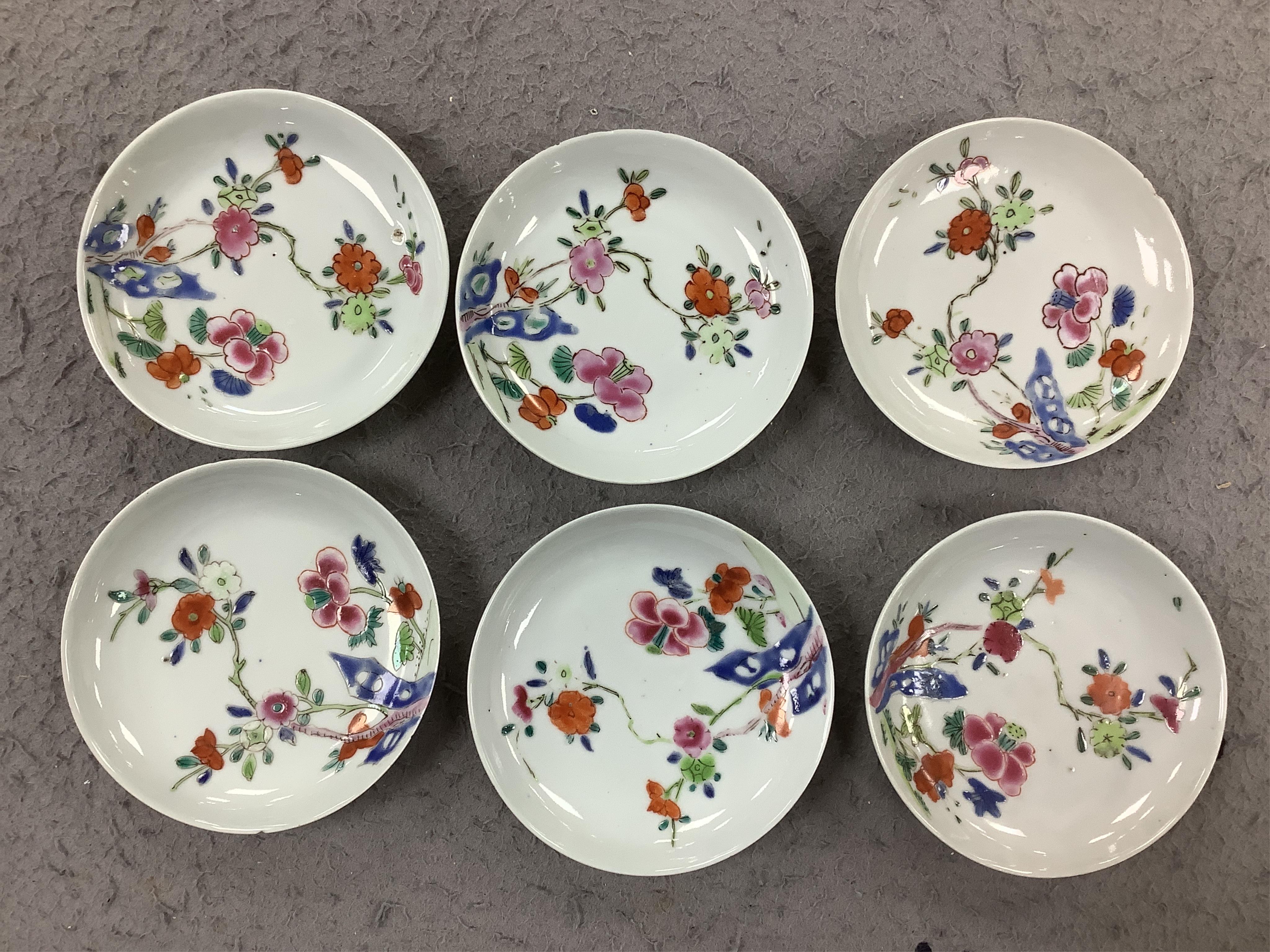 An 18th century Chinese porcelain teapot and a set of tea bowls and saucers, teapot 13cm high. Condition - mixed poor to fair
